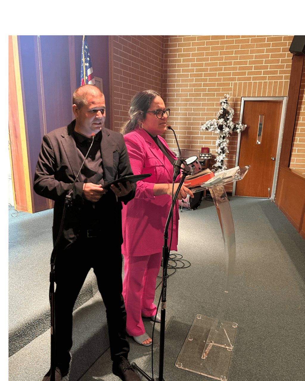 Worship leaders at the lectern